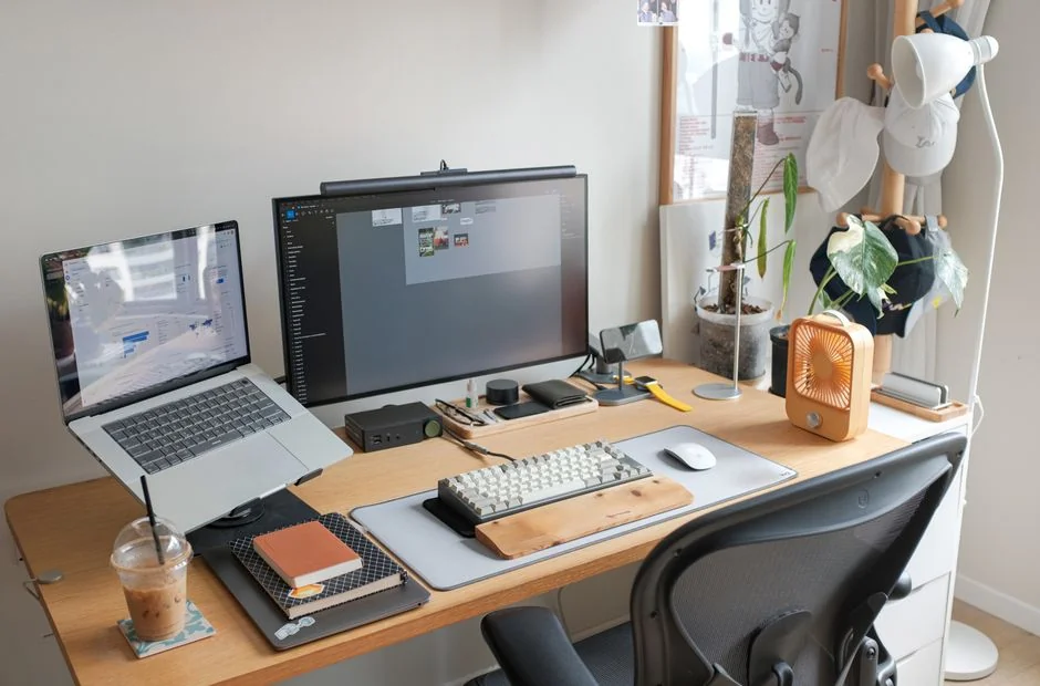A tablet with a financial website open, alongside a white keyboard and mouse. Ideal for tech-theme stock images.